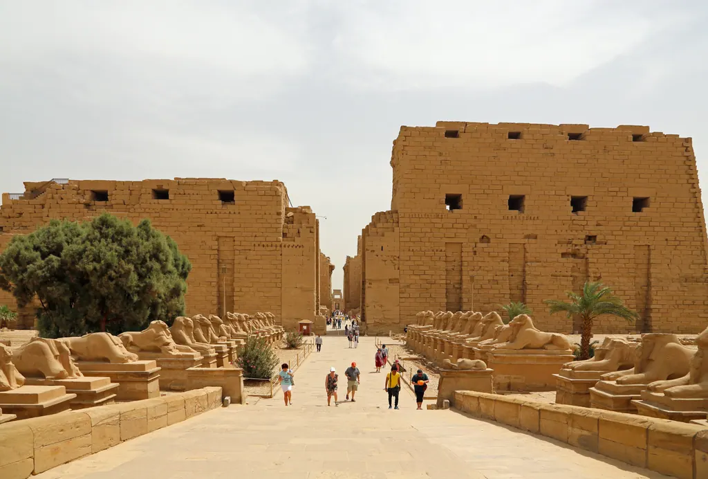 The first pylon of Karnak Temple with the avenue of ram-headed sphinxes in front