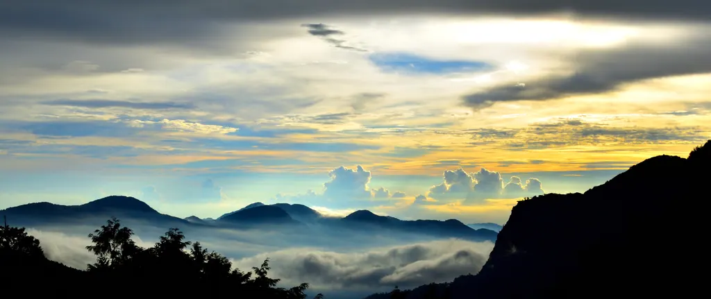Sunrise over a sea of clouds and mountain ridges in the Alishan National Forest Recreation Area