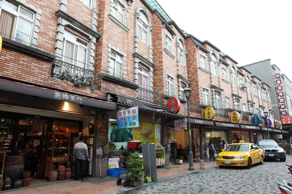 Brick shop fronts and pottery stores along a street in Yingge Old Street